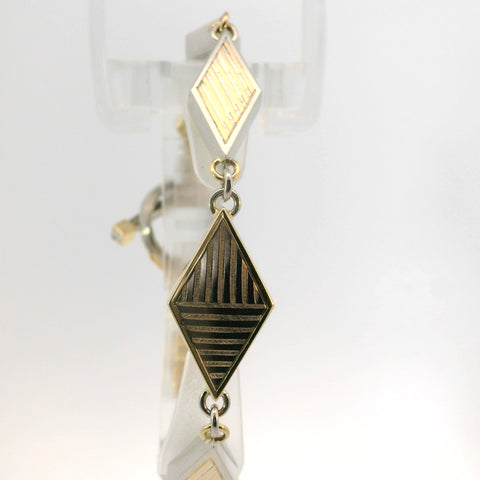 YELLOW GOLD AND PLATINUM REVERSIBLE DIAMOND MOKUME BRACELET WITH TOGGLE CLASP