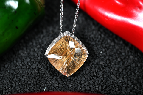 21.14CT RUTILATED QUARTZ AND DIAMOND PENDANT