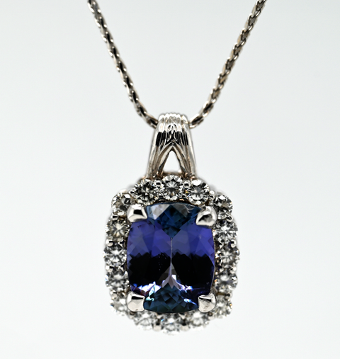 3.89CT NATURAL TANZANITE AND DIAMOND PENDANT