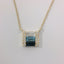 14K Yellow Gold Baguette Blue and White Topaz, Baguette Sapphire, and Diamond Accent Pendant