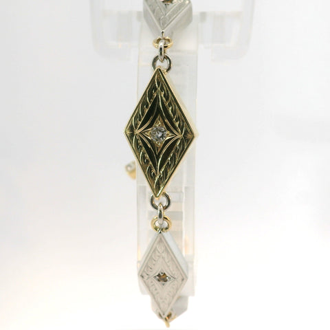 YELLOW GOLD AND PLATINUM REVERSIBLE DIAMOND MOKUME BRACELET WITH TOGGLE CLASP