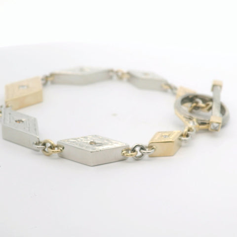 YELLOW GOLD AND PLATINUM REVERSIBLE DIAMOND MOKUME BRACELET WITH TOGGLE CLASP