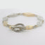 YELLOW GOLD AND PLATINUM REVERSIBLE DIAMOND MOKUME BRACELET WITH TOGGLE CLASP