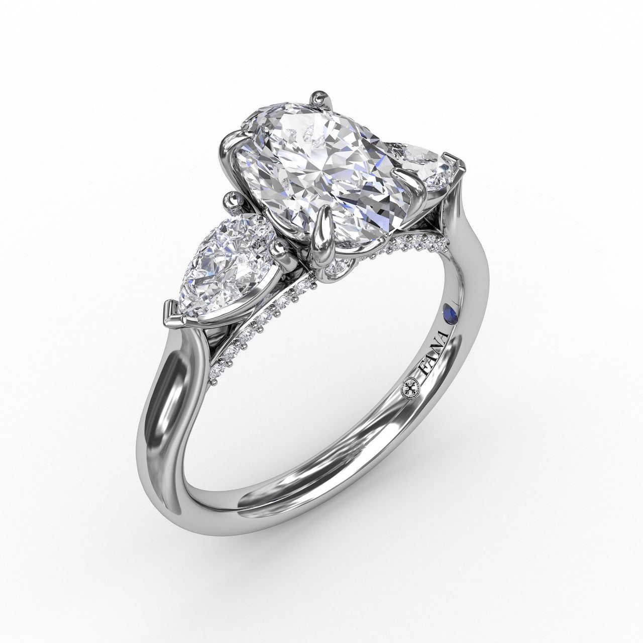 Classic three clearance stone engagement rings